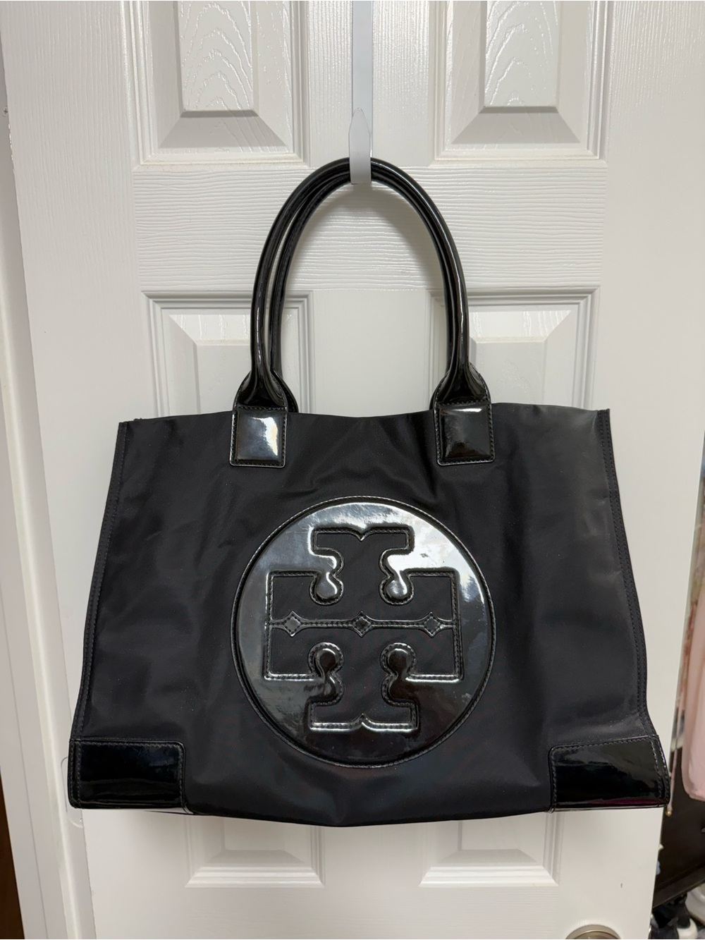Tory Burch Black Tote Bag with Glossy Medallion Accent